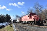 GP7u # 23 leads the train past the Whippany Railway Museum 